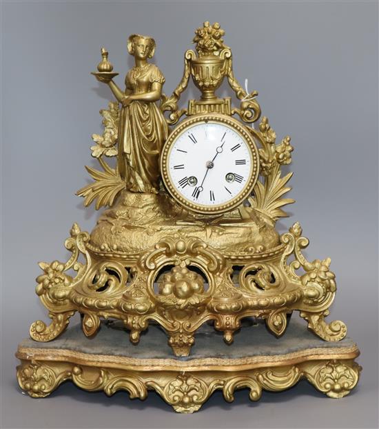 A French Spelter mantel clock and stand height 35cm